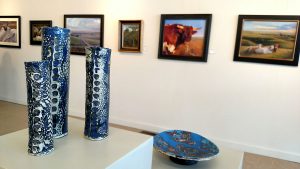 Jennifer Mettlen Nolan's ceramics and jewelry for the Paper & Fire exhibit on display through June 30, 2017.